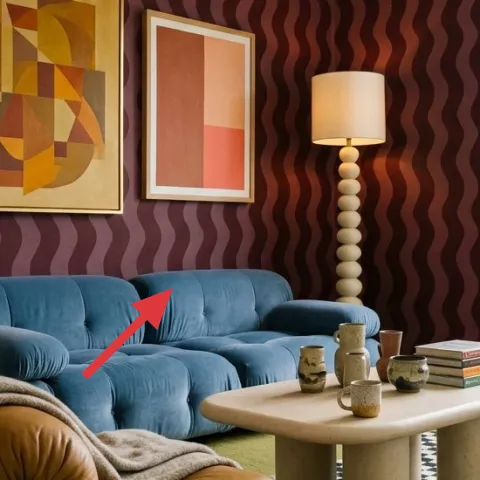 blue tufted sofa