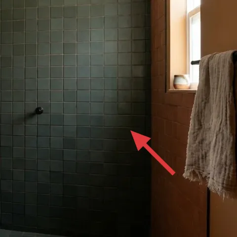 gray bath towel for hanging on the vanity side