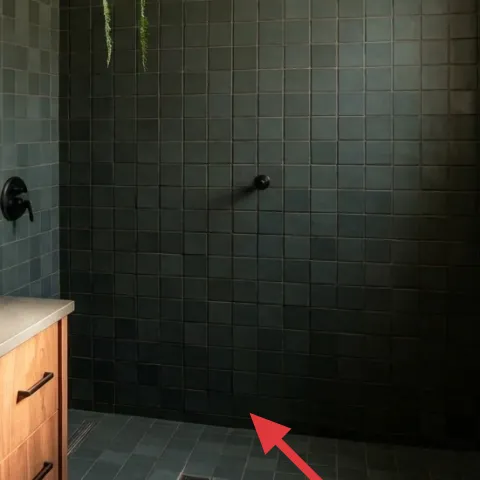 small bath mat in front of the vanity