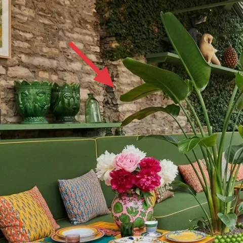decorative green ceramic planters on the wall shelf