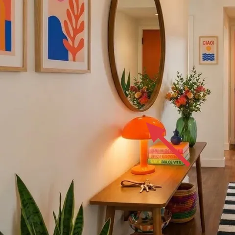 Vase with orange and red flowers