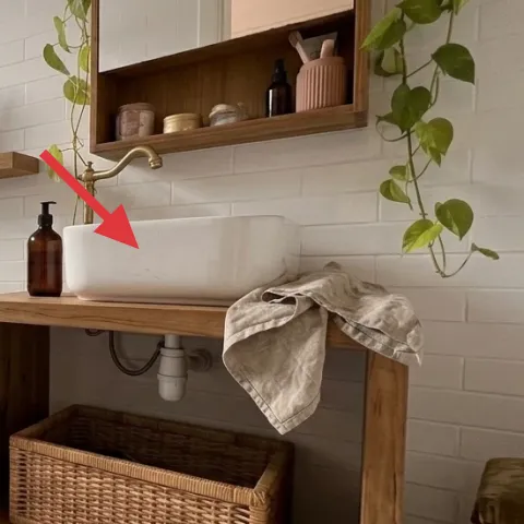 Brass faucet on sink