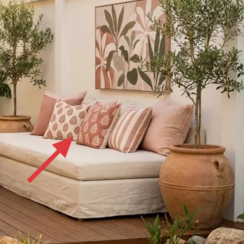 blush throw pillow with pattern