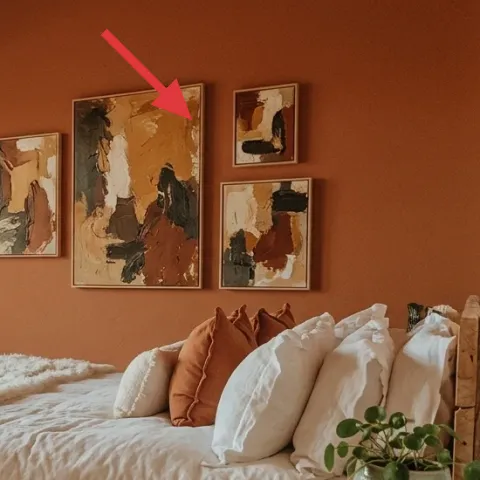 framed abstract art print (left of cluster)