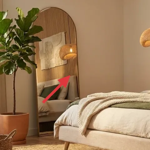 Arched leaning floor mirror
