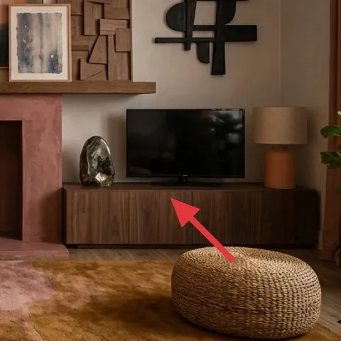 light-wood media console under TV