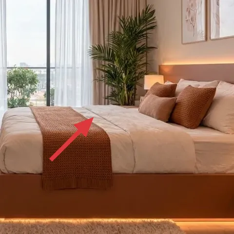 textured throw blanket on bed