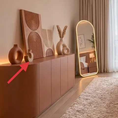ceramic vases and decor objects on dresser