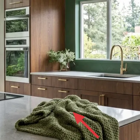 green knitted throw blanket