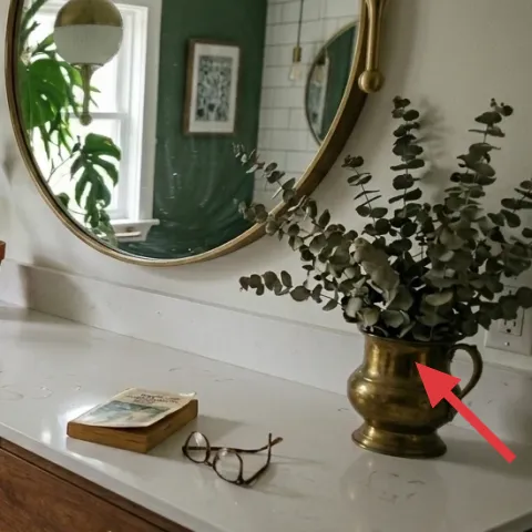 large vase with eucalyptus branches
