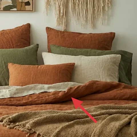 Tan throw blanket with fringed edge