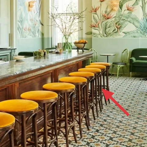 yellow-cushioned bar stools